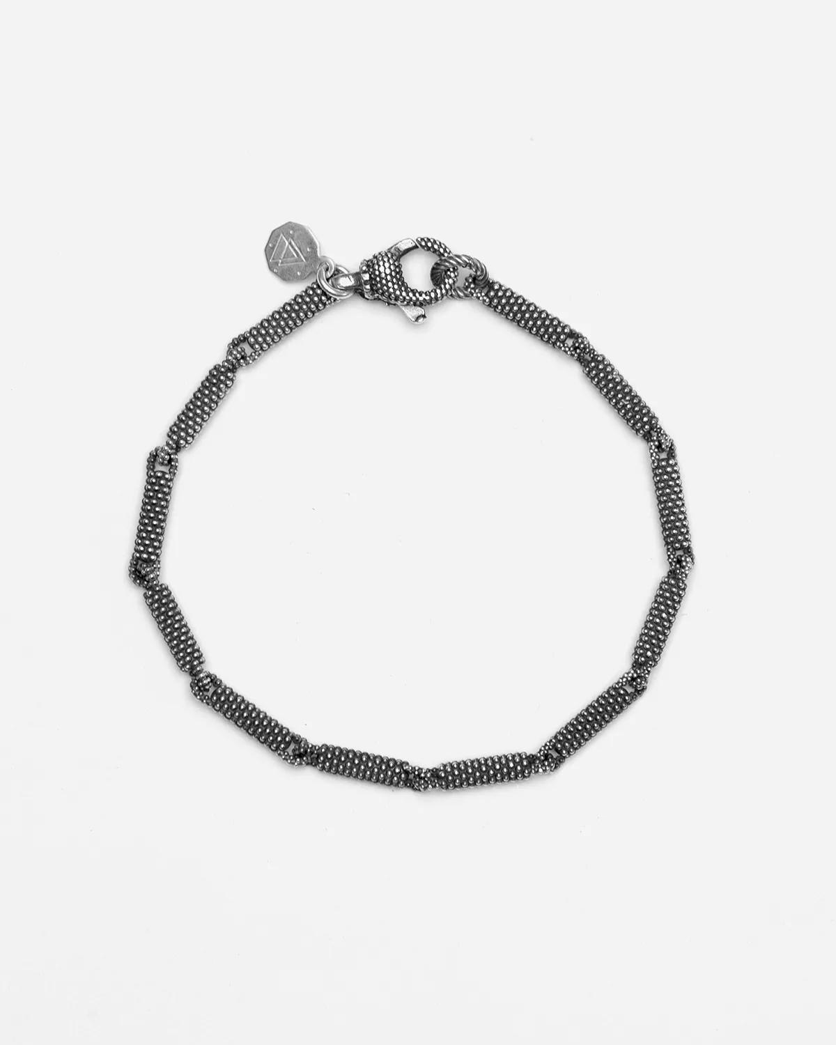 BRACCIALE IN ARGENTO ROLLER PUNTINATI