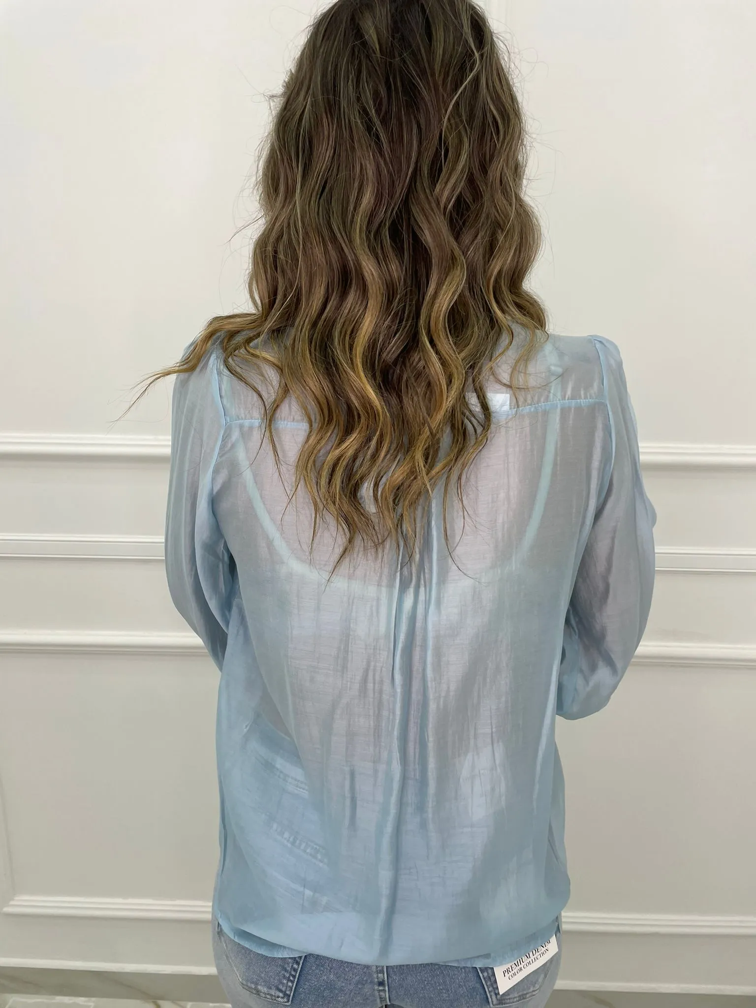 Camicia over velata con applicazione fiore