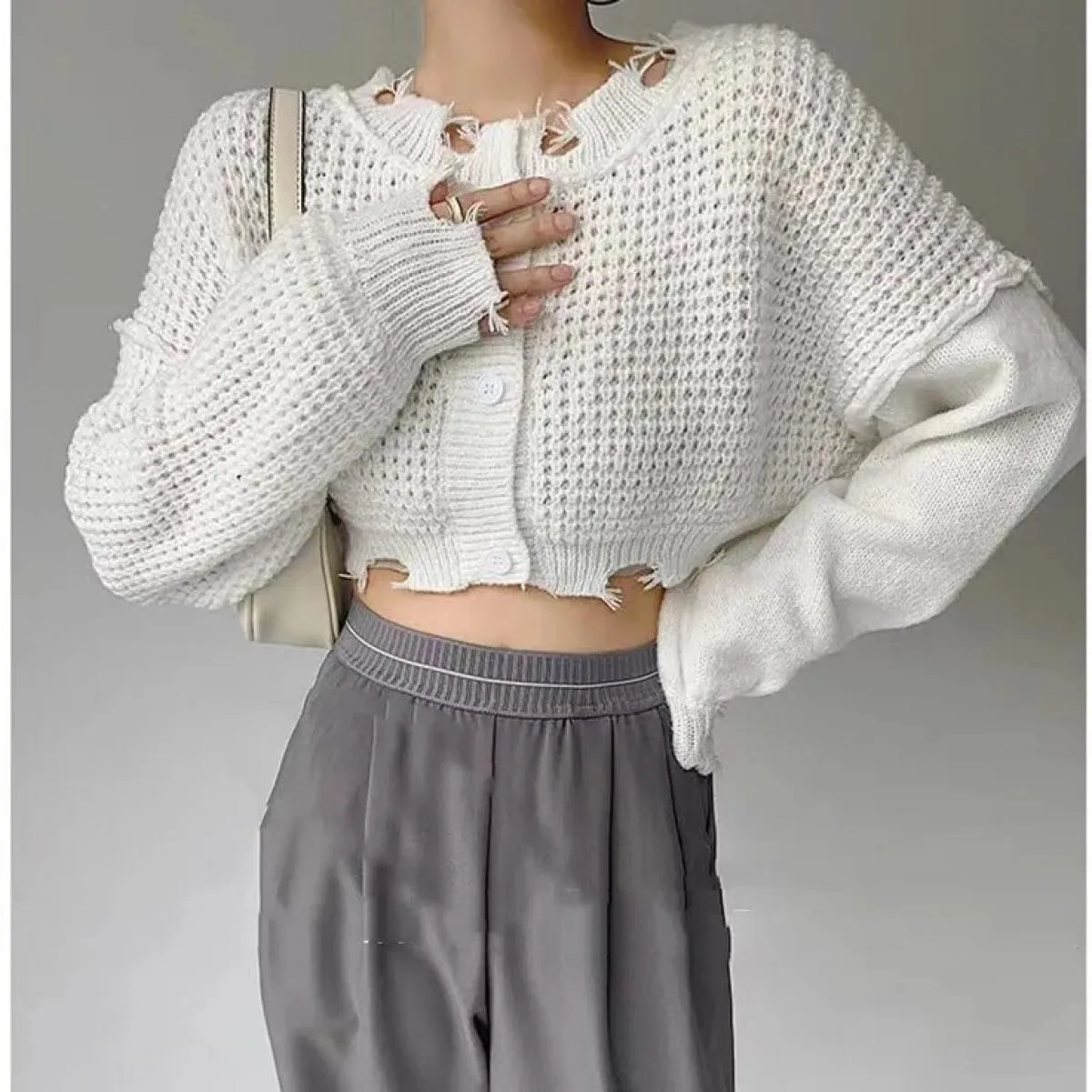 Cappotto cardigan maglione lavorato a maglia 2023 Autunno Nuovo design Senso Top corto a maniche lunghe piccolo