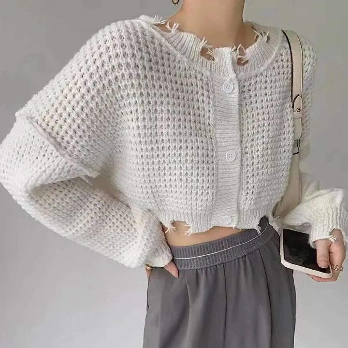Cappotto cardigan maglione lavorato a maglia 2023 Autunno Nuovo design Senso Top corto a maniche lunghe piccolo