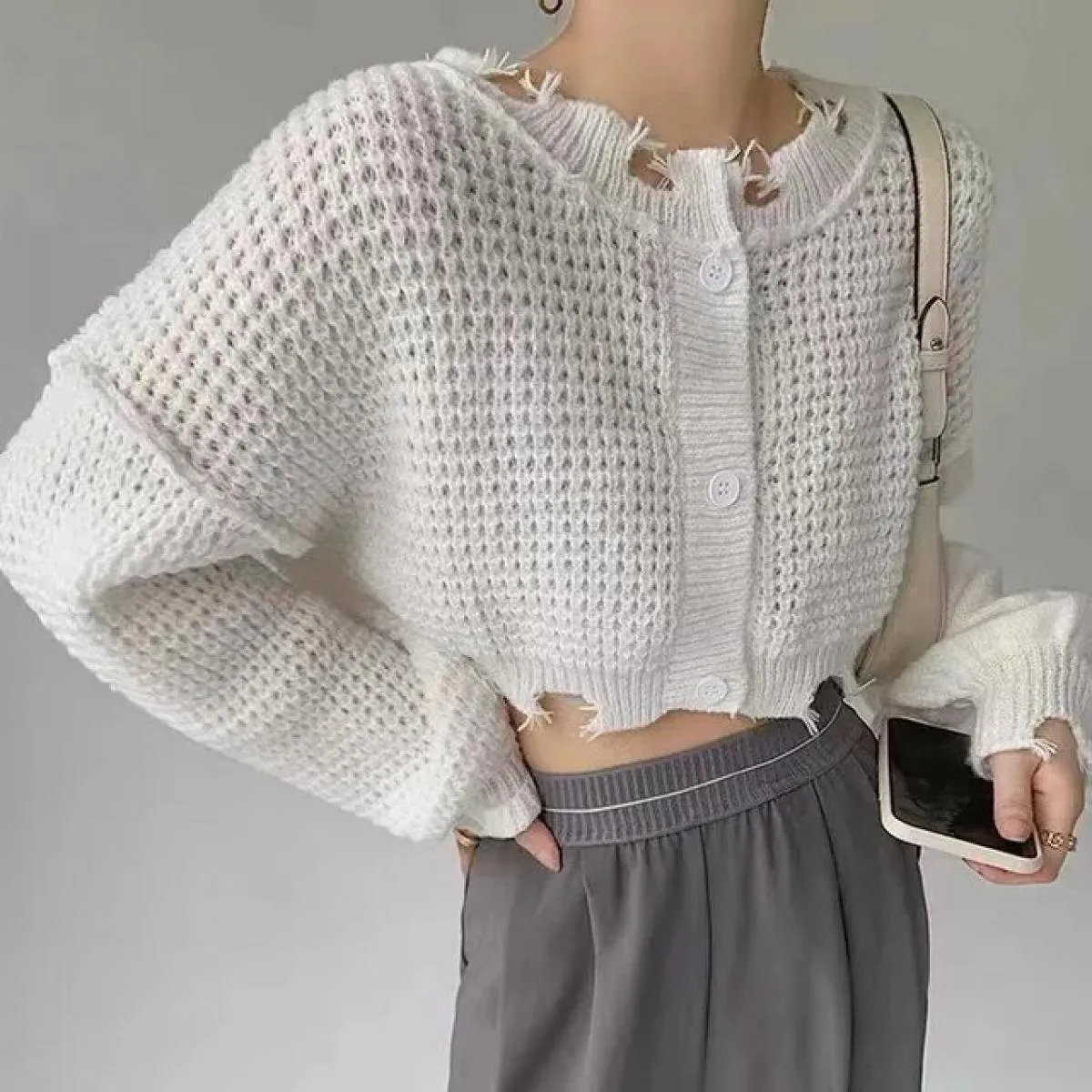 Cappotto cardigan maglione lavorato a maglia 2023 Autunno Nuovo design Senso Top corto a maniche lunghe piccolo
