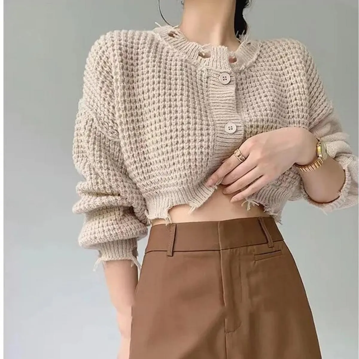 Cappotto cardigan maglione lavorato a maglia 2023 Autunno Nuovo design Senso Top corto a maniche lunghe piccolo