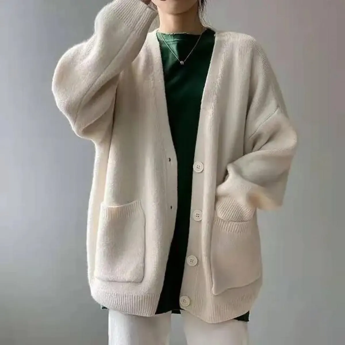 Cappotto maglione Abbigliamento donna 2023 Primavera e autunno Nuovo cardigan lavorato a maglia in tinta unita sciolto