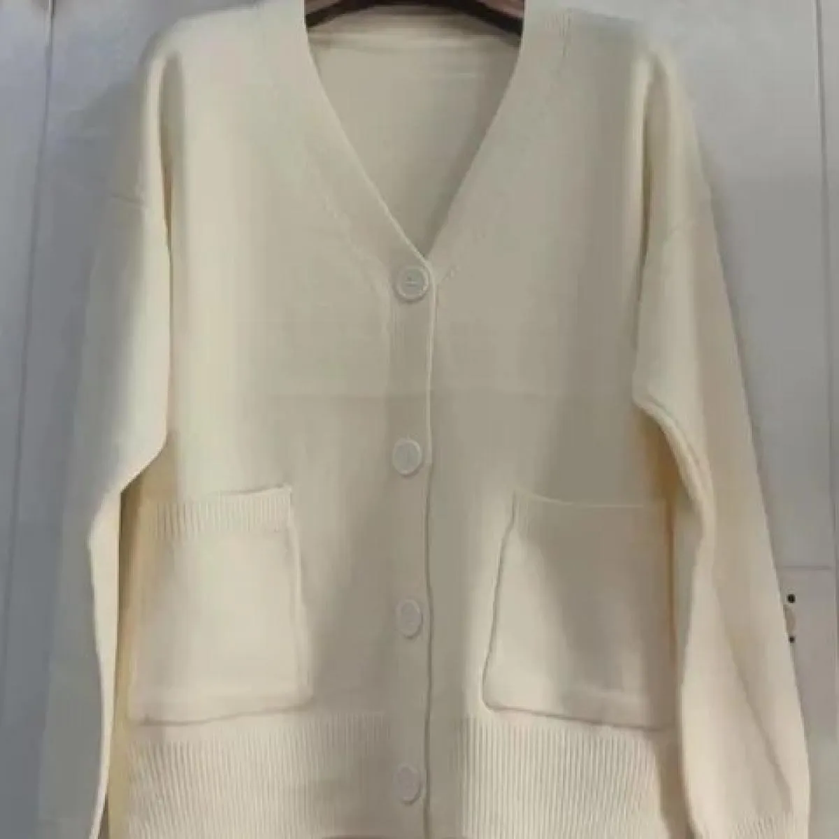 Cappotto maglione Abbigliamento donna 2023 Primavera e autunno Nuovo cardigan lavorato a maglia in tinta unita sciolto