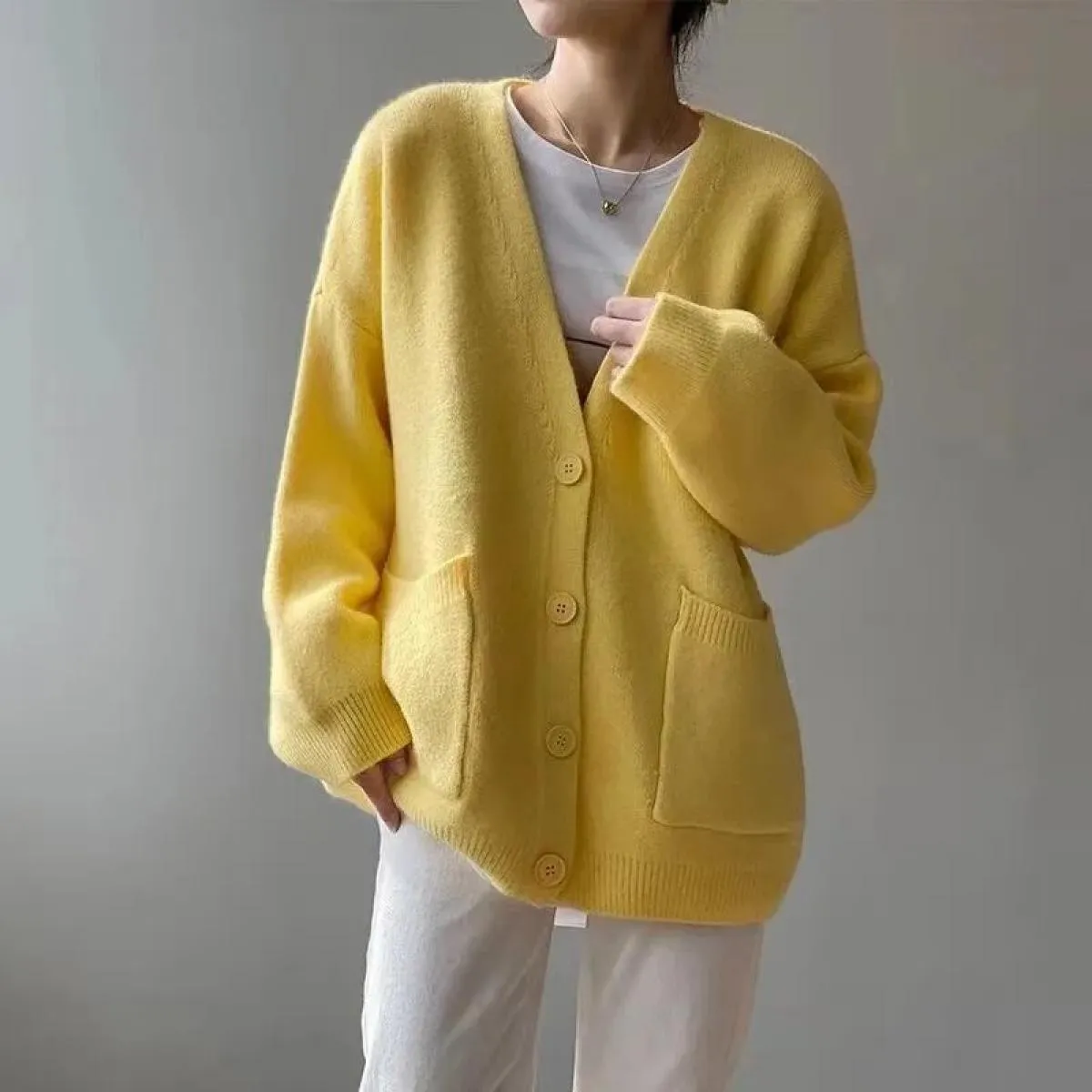 Cappotto maglione Abbigliamento donna 2023 Primavera e autunno Nuovo cardigan lavorato a maglia in tinta unita sciolto