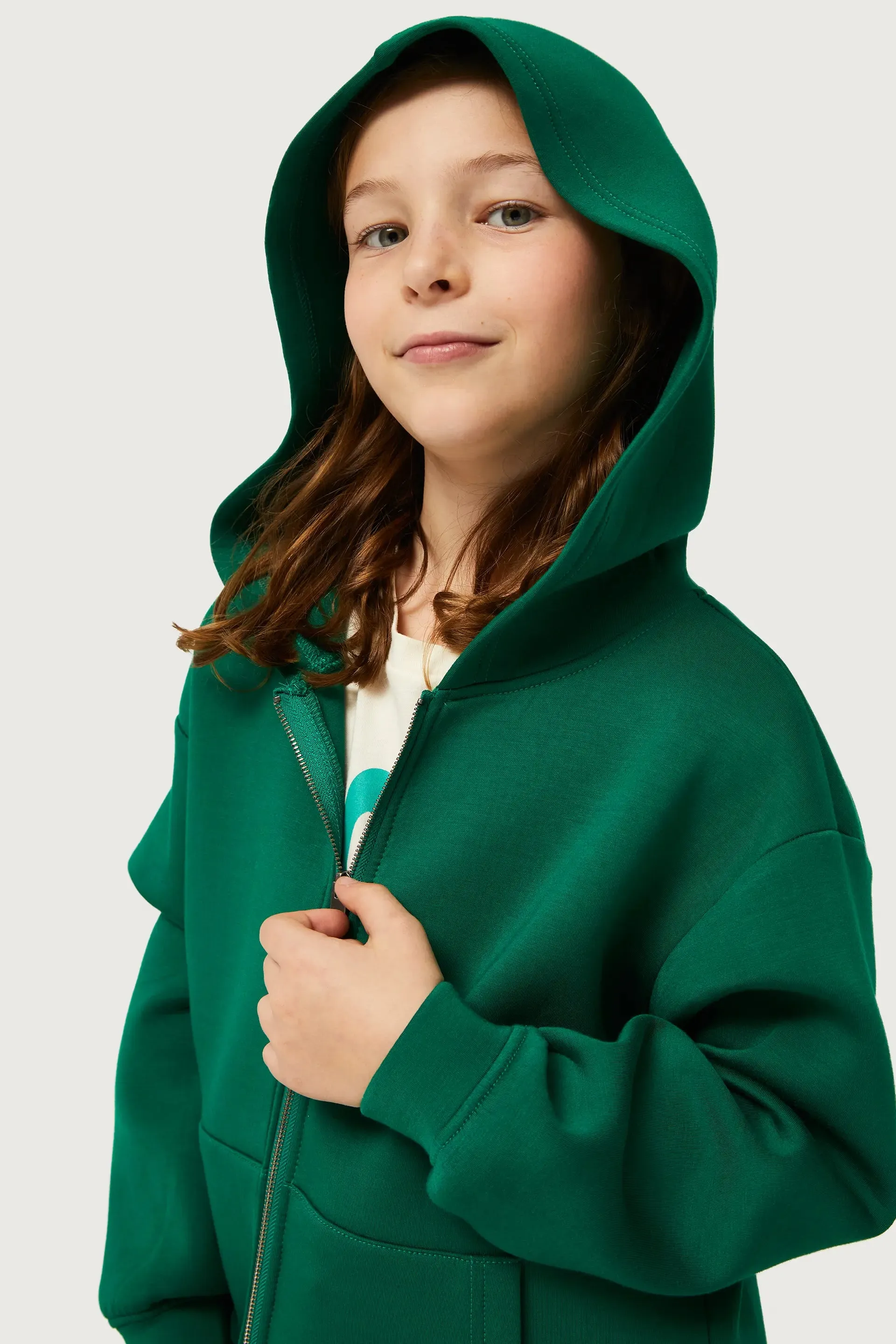 Felpa verde con cappuccio da bambina