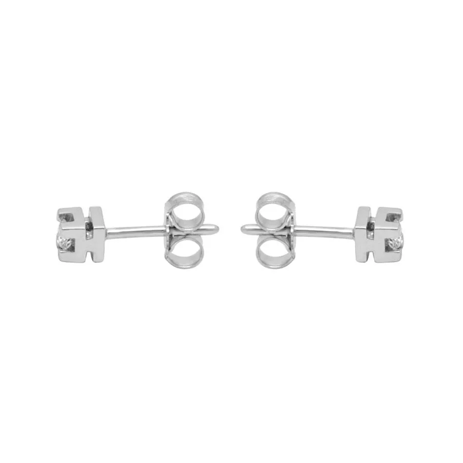 Orecchini punto luce in oro bianco con diamanti 0.18 ct