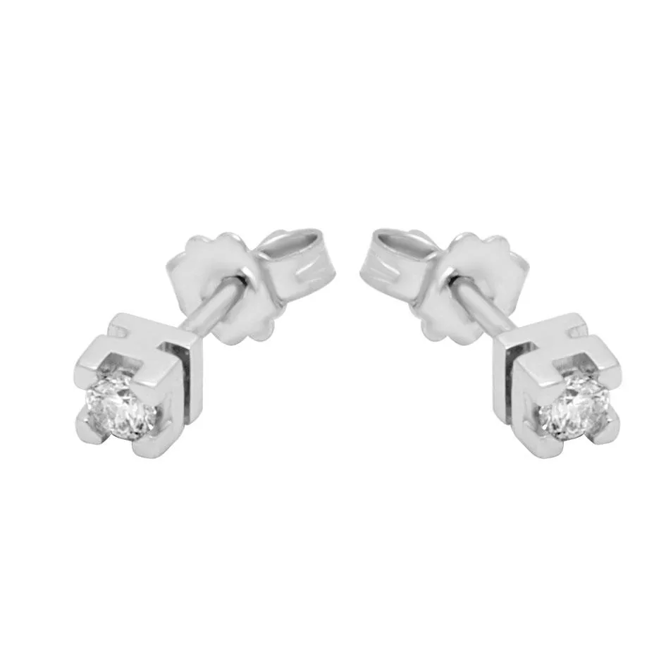Orecchini punto luce in oro bianco con diamanti 0.18 ct