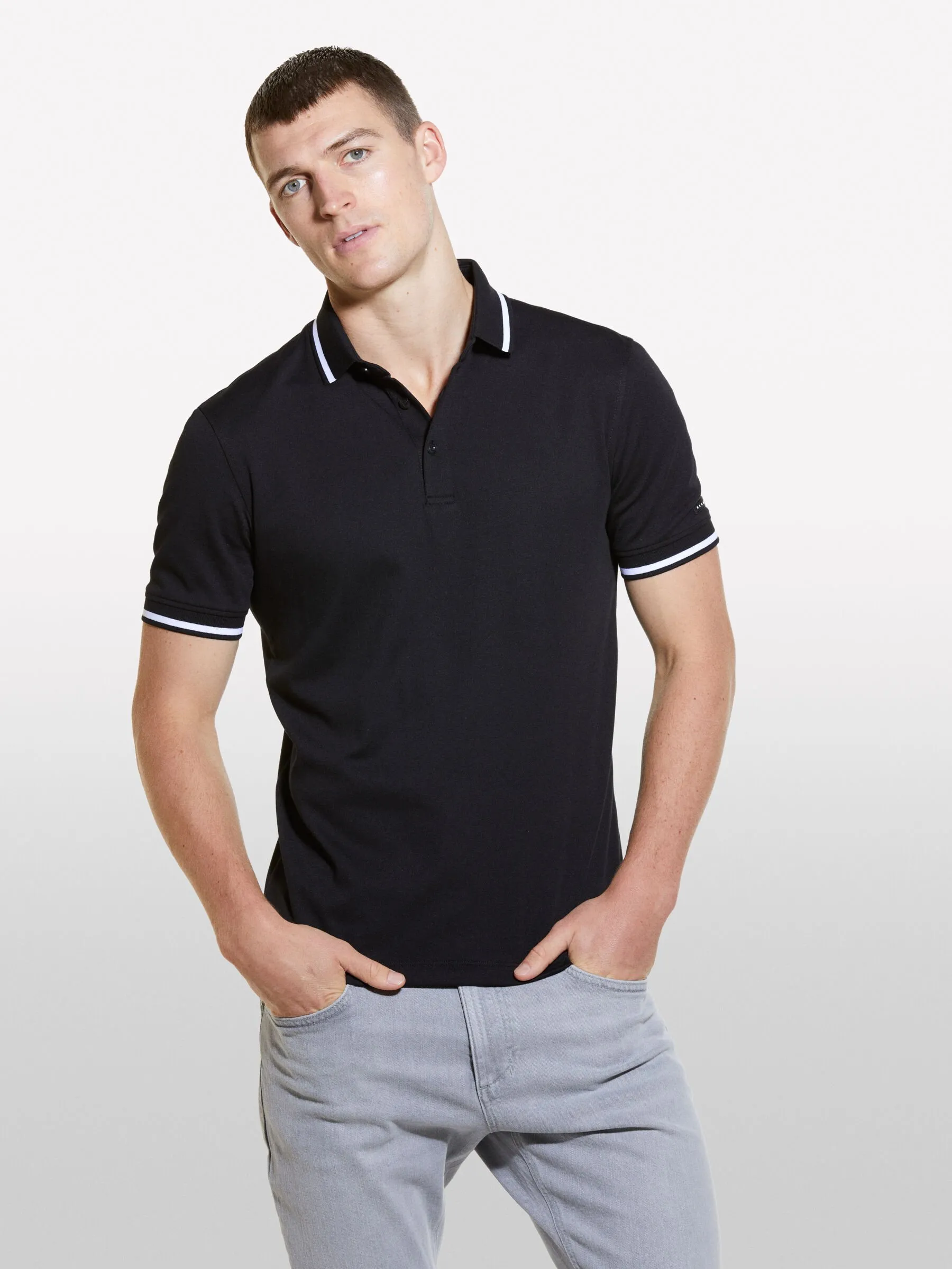 Polo slim fit nera con contrasto